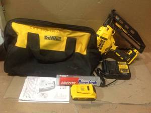 lot 83 image: 20-Volt Max 16-Gauge Cordless Angled Finish Nailer Kit by DEWALT Customer Return See pictures