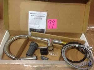 lot 99 image: Glacier Bay Utility Faucet 1521US  24262 Customer Return See pictures