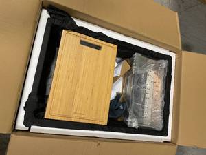 lot 106 image: All-in-One Undermount Stainless Steel 30 in. Single Bowl Kitchen Workstation Sink with Faucet and Accessories Kit by Glacier Bay Customer Returns See Pictures