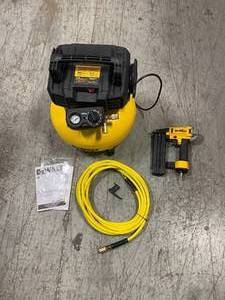lot 107 image: 6 Gal. 18-Gauge Brad Nailer and Heavy-Duty Pancake Electric Air Compressor Combo Kit (1-Tool) by DEWALT Customer Returns See Pictures