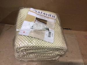 lot 68 image: Grid White 9 ft. x 12 ft. Non-Slip Rug Pad by Safavieh&nbspCustomer Returns See Pictures