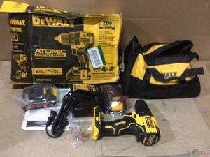 lot 27 image: ATOMIC 20-Volt MAX Cordless Brushless Compact 12 in. DrillDriver, (2) 20-Volt 1.3Ah Batteries, Charger & Bag by DEWALT &nbspCustomer Returns See Pictures