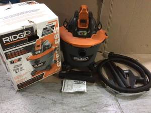lot 46 image: 9 Gal. 18-Volt Cordless WetDry Shop Vacuum (Tool Only) with Filter, Hose and Accessories by RIDGID &nbspCustomer Returns See Pictures