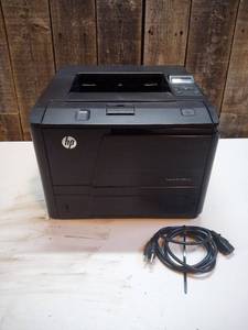 lot 2 image: HP Laserjet Pro 400 M401 Series with power cord