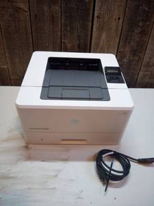 lot 4 image: HP LaserJet Pro M402 with power cord