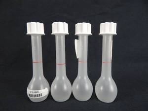 lot 31 image: Set of 4 Kartell 25 ML Plastic Volumetric Flasks With Screw Caps