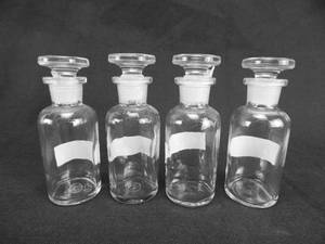 lot 39 image: Set of 4 Vintage Wheaton Glass Company 40 ML Narrow Mouth Glass Bottles With Stoppers