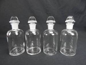 lot 53 image: Set of 4 Corning Pyrex 250 ML Glass Bottles With Stoppers