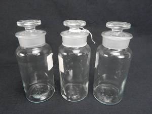 lot 58 image: Set of 3 Vintage T.C.W. Company 500 ML Wide Mouth Glass Bottles With Stoppers