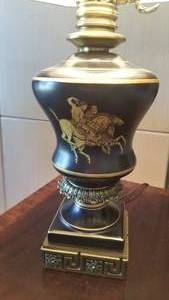 lot 63 image: Vintage Black Stiffel Table Lamp with Greco Men on Horseback