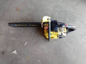 lot 38 image: John Deere Chainsaw