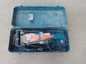 lot 63 image: Makita Cement Planer