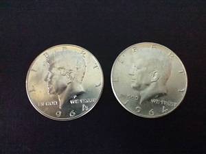 lot 55 image: 2 90% Silver Kennedy Half Dollars
