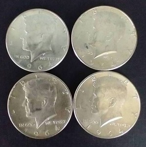 lot 23 image: 4 1964 Kennedy 90% Silver Half Dollars