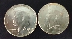 lot 34 image: 2 90% Silver Kennedy Half Dollars