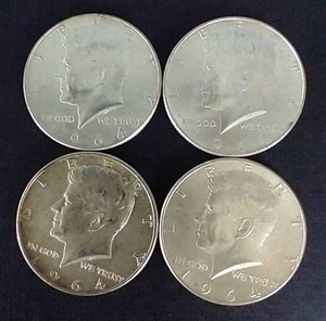lot 53 image: 4 1964 Kennedy 90% Silver Half Dollars