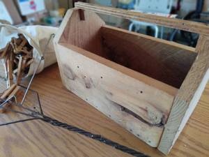 lot 144 image: Vintage Rug Beater, Clothespins, & Wooden Box