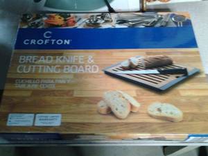 lot 30 image: Crofton  Bread knife and cutting bo...