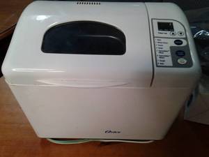 lot 42 image: Oster table top bread maker...