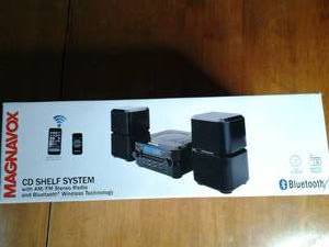 lot 54 image: Magnolox CD shelf system with AMFM ...