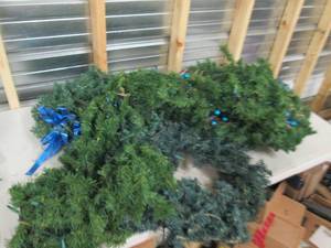 4 christmas wreaths and lighted gar...