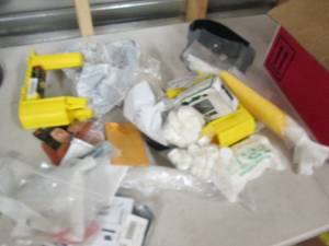 box of nails, botls, tape dispeners...