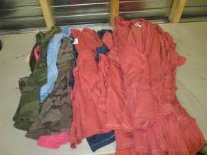 24 womens size meduim shirts all ne...