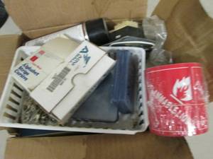 box of name tag holders, white boar...