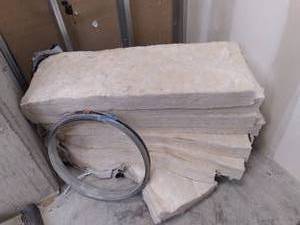 8 pc. Sections of Insulation & Roll of Sheet Metal Stripping (2)