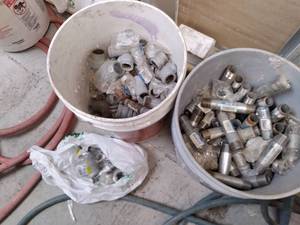 (2) Pails of Fittings...