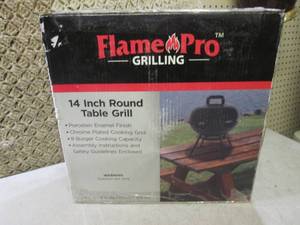 lot 28 image: (D-2) Flame Pro 14 Inch Round Table...
