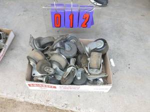 Flat of casters. As shown.