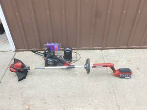 Craftsman 60 volt electric chainsaw & trimmer with battery & charger. Like new. Tested & works. As shown.