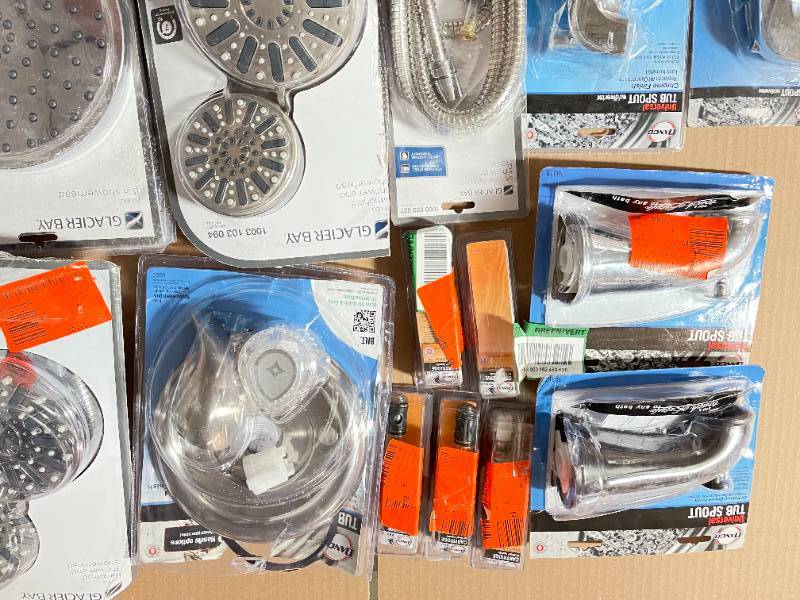 Lot of Moen Shower Heads, and other plumbing