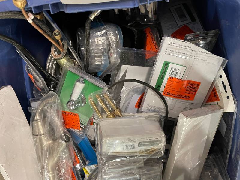 Tote full of Danco, Moen Bathroom, Kitchen faucets, and other plumbing