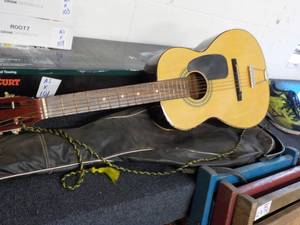 Guitar with Case needs string and ...