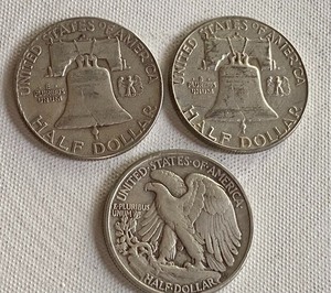 Two 1962 Benjamin Franklin Silver Coins & (1) 1943 Walking Liberty Coin