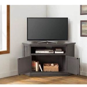 lot 12 image: Rustic Corner Grey Wood Corner TV Stand by Martin Svensson Home Its Retail price is $377