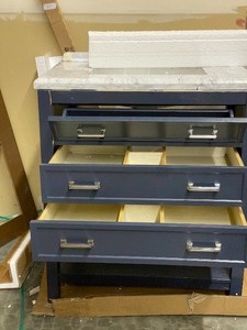 lot 70 image: Everett 31 in. W x 22 in. D Vanity Cabinet in Aegean Blue with Carrara Marble Vanity Top in White with White Basin