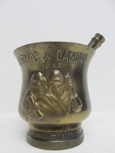 lot 25 image: Vintage Embossed Brass Cosmas & Damian Pharmacy Mortar & Pestle