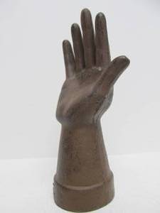 lot 35 image: Heavy Cast Iron Hand Ring Display