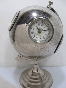 lot 103 image: Larger Chrome World Globe wBuilt in World Clocks