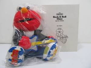 lot 287 image: New in Box Rock & Roll Elmo