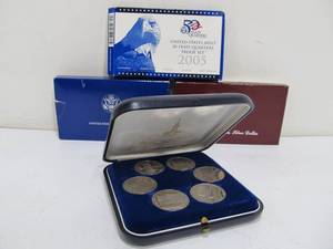 lot 351 image: Group of Mint US & Olympic Coins - Including Liberty Silver Dollars
