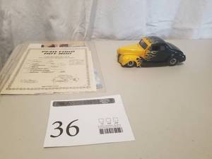lot 36 image: 124 Scale 1940 Ford Deluxe Hot Rod Coupe Die-cast Metal Replica Model by Danbury Mint