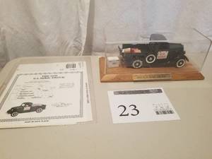 lot 23 image: 124 Scale 1935 Ford 50-830 Half-Ton Pickup Truck Die-cast Metal Replica Model by Danbury Mint