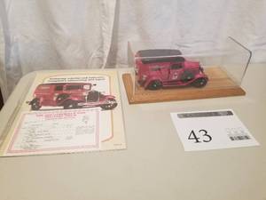 lot 43 image: 124 Scale 1931 Ford Panel Delivery Truck Die-cast Metal Replica Model by Danbury Mint