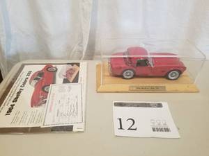 lot 12 image: 124 Scale 1964 Shelby Cobra 289 Hardtop Convertible Die-cast Metal Replica Model by Danbury Mint