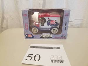 lot 50 image: 124 Scale 1912 Ford Delivery Truck Collectors  Series Heavy Die-Cast Metal Coin Bank (in original packaging)