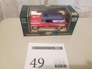 lot 49 image: 1957 Chevrolet Wagin Limited Edition Die-cast Metal Coin Bank by lib (in original packaging)